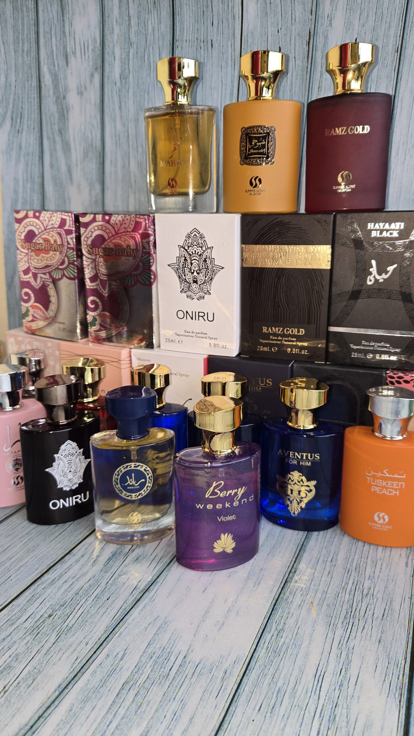 25ml summer scents available in Aventus Blue | Taskeen Peach | Lazurde rouge | Ramz Gold | Shamoky | Oniru | Yara Pink | Black Mahir | Sugar Baby | Berry Weekend | Summer Pink | Luxe | Haayati
